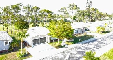 Absolutely stunning 2-bd, 2-ba home with modern updates & a on Del Tura Golf and Country Club in Florida - for sale on GolfHomes.com, golf home, golf lot