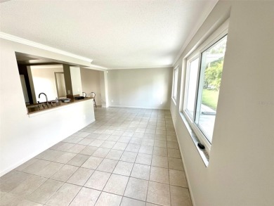 Wow!! Amazing home which has been remodeled beautifully in the on Mainlands Golf Club in Florida - for sale on GolfHomes.com, golf home, golf lot