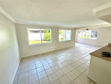 Wow!! Amazing home which has been remodeled beautifully in the on Mainlands Golf Club in Florida - for sale on GolfHomes.com, golf home, golf lot