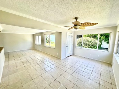Wow!! Amazing home which has been remodeled beautifully in the on Mainlands Golf Club in Florida - for sale on GolfHomes.com, golf home, golf lot