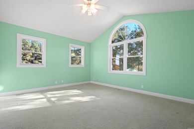 Situated overlooking one of Isabella Golf Course's scenic par 3s on Isabella Golf Course  in Arkansas - for sale on GolfHomes.com, golf home, golf lot