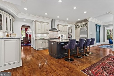 Welcome to an extraordinary six-bedroom, seven full and two on The Golf Club of Georgia in Georgia - for sale on GolfHomes.com, golf home, golf lot