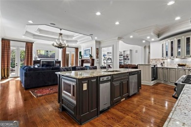 Welcome to an extraordinary six-bedroom, seven full and two on The Golf Club of Georgia in Georgia - for sale on GolfHomes.com, golf home, golf lot
