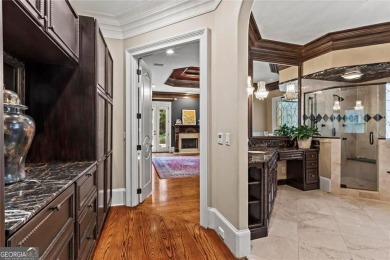 Welcome to an extraordinary six-bedroom, seven full and two on The Golf Club of Georgia in Georgia - for sale on GolfHomes.com, golf home, golf lot
