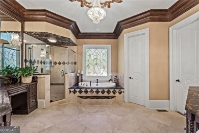 Welcome to an extraordinary six-bedroom, seven full and two on The Golf Club of Georgia in Georgia - for sale on GolfHomes.com, golf home, golf lot
