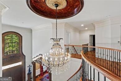 Welcome to an extraordinary six-bedroom, seven full and two on The Golf Club of Georgia in Georgia - for sale on GolfHomes.com, golf home, golf lot