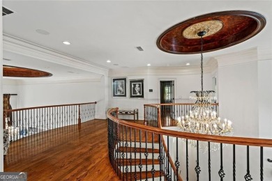 Welcome to an extraordinary six-bedroom, seven full and two on The Golf Club of Georgia in Georgia - for sale on GolfHomes.com, golf home, golf lot