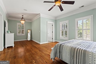 Welcome to an extraordinary six-bedroom, seven full and two on The Golf Club of Georgia in Georgia - for sale on GolfHomes.com, golf home, golf lot