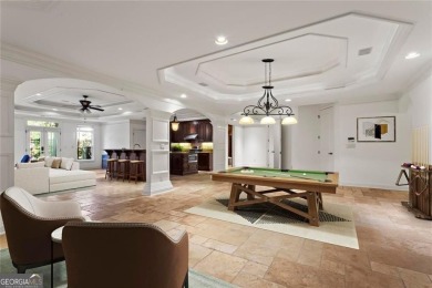 Welcome to an extraordinary six-bedroom, seven full and two on The Golf Club of Georgia in Georgia - for sale on GolfHomes.com, golf home, golf lot