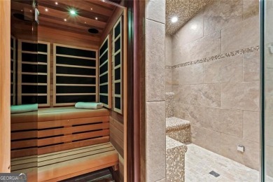 Welcome to an extraordinary six-bedroom, seven full and two on The Golf Club of Georgia in Georgia - for sale on GolfHomes.com, golf home, golf lot
