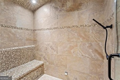 Welcome to an extraordinary six-bedroom, seven full and two on The Golf Club of Georgia in Georgia - for sale on GolfHomes.com, golf home, golf lot