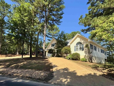 Situated overlooking one of Isabella Golf Course's scenic par 3s on Isabella Golf Course  in Arkansas - for sale on GolfHomes.com, golf home, golf lot