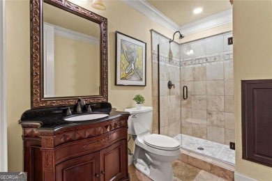 Welcome to an extraordinary six-bedroom, seven full and two on The Golf Club of Georgia in Georgia - for sale on GolfHomes.com, golf home, golf lot