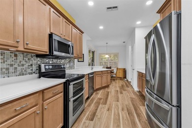 INCREDIBLE VALUE in this 2010 built BRISTOL II upgraded and on Kings Gate Golf Club in Florida - for sale on GolfHomes.com, golf home, golf lot