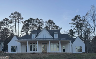 Exclusive Luxury in beautiful Harbor Club, a gated Lake Oconee on Harbor Club Golf and Country Club in Georgia - for sale on GolfHomes.com, golf home, golf lot