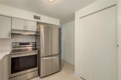 One or more photo(s) has been virtually staged. Charming Dunedin on The Dunedin Country Club in Florida - for sale on GolfHomes.com, golf home, golf lot
