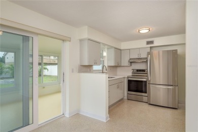 One or more photo(s) has been virtually staged. Charming Dunedin on The Dunedin Country Club in Florida - for sale on GolfHomes.com, golf home, golf lot