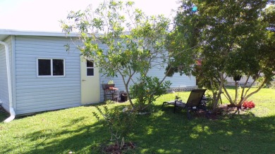 Another nice quaint 2 bedroom, front screened room for friendly on Schalamar Creek Golf and Country Club in Florida - for sale on GolfHomes.com, golf home, golf lot