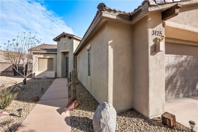 Welcome to the good life at Laughlin Ranch! Tucked at the end of on Laughlin Ranch Golf Club in Arizona - for sale on GolfHomes.com, golf home, golf lot