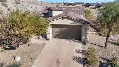 Welcome to the good life at Laughlin Ranch! Tucked at the end of on Laughlin Ranch Golf Club in Arizona - for sale on GolfHomes.com, golf home, golf lot