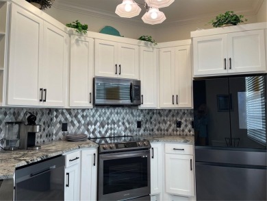 Newly Furnished and Remodeled Waterfront condo on the second on The Groves Golf and Country Club in Florida - for sale on GolfHomes.com, golf home, golf lot