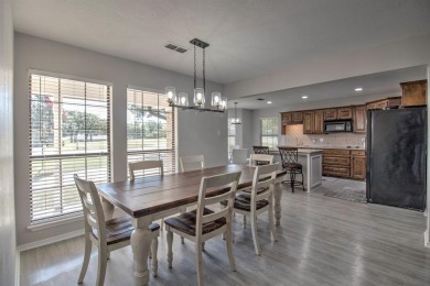 This charming home features fresh paint and new flooring on Lake Kiowa Golf Course in Texas - for sale on GolfHomes.com, golf home, golf lot