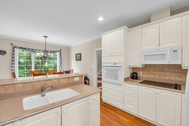Come see this elegant brick home situated on a quiet street in on Porters Neck Country Club in North Carolina - for sale on GolfHomes.com, golf home, golf lot
