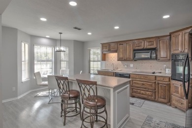 This charming home features fresh paint and new flooring on Lake Kiowa Golf Course in Texas - for sale on GolfHomes.com, golf home, golf lot