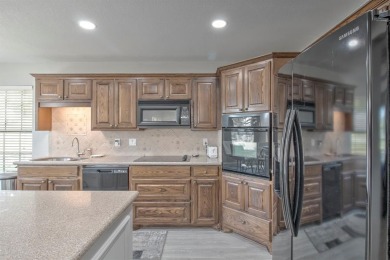 This charming home features fresh paint and new flooring on Lake Kiowa Golf Course in Texas - for sale on GolfHomes.com, golf home, golf lot