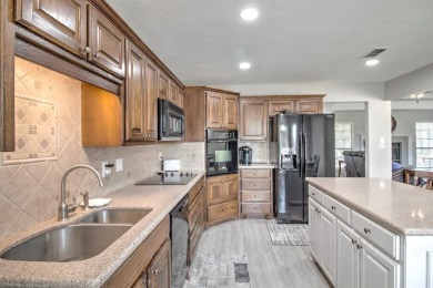 This charming home features fresh paint and new flooring on Lake Kiowa Golf Course in Texas - for sale on GolfHomes.com, golf home, golf lot