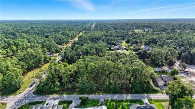 Build your dream on this oversized half-acre lot in the growing on Lehigh Resort Club in Florida - for sale on GolfHomes.com, golf home, golf lot