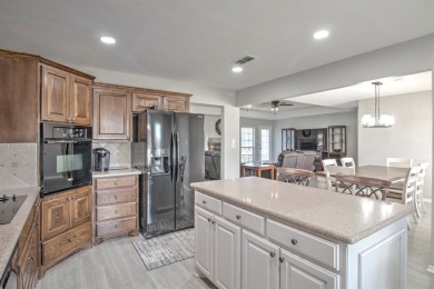 This charming home features fresh paint and new flooring on Lake Kiowa Golf Course in Texas - for sale on GolfHomes.com, golf home, golf lot