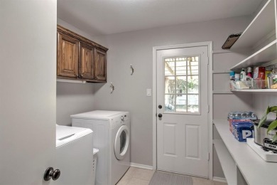 This charming home features fresh paint and new flooring on Lake Kiowa Golf Course in Texas - for sale on GolfHomes.com, golf home, golf lot
