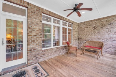 Come see this elegant brick home situated on a quiet street in on Porters Neck Country Club in North Carolina - for sale on GolfHomes.com, golf home, golf lot