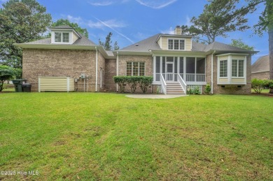 Come see this elegant brick home situated on a quiet street in on Porters Neck Country Club in North Carolina - for sale on GolfHomes.com, golf home, golf lot