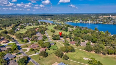 This charming home features fresh paint and new flooring on Lake Kiowa Golf Course in Texas - for sale on GolfHomes.com, golf home, golf lot