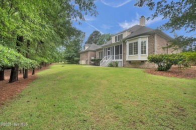 Come see this elegant brick home situated on a quiet street in on Porters Neck Country Club in North Carolina - for sale on GolfHomes.com, golf home, golf lot