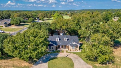 This charming home features fresh paint and new flooring on Lake Kiowa Golf Course in Texas - for sale on GolfHomes.com, golf home, golf lot