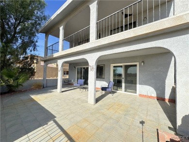 This unique two-story home, located on the green in the private on Chaparral Golf and Country Club in Arizona - for sale on GolfHomes.com, golf home, golf lot