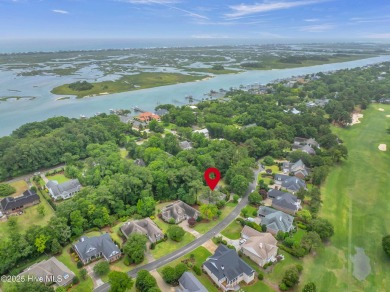 Come see this elegant brick home situated on a quiet street in on Porters Neck Country Club in North Carolina - for sale on GolfHomes.com, golf home, golf lot