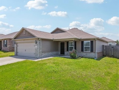 Tucked away in a well-established neighborhood and less than a on White Hawk Golf Club in Oklahoma - for sale on GolfHomes.com, golf home, golf lot