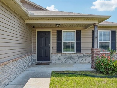 Tucked away in a well-established neighborhood and less than a on White Hawk Golf Club in Oklahoma - for sale on GolfHomes.com, golf home, golf lot