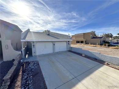 This unique two-story home, located on the green in the private on Chaparral Golf and Country Club in Arizona - for sale on GolfHomes.com, golf home, golf lot