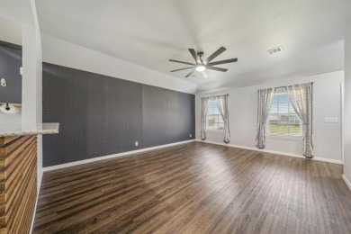 Tucked away in a well-established neighborhood and less than a on White Hawk Golf Club in Oklahoma - for sale on GolfHomes.com, golf home, golf lot
