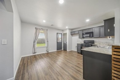 Tucked away in a well-established neighborhood and less than a on White Hawk Golf Club in Oklahoma - for sale on GolfHomes.com, golf home, golf lot