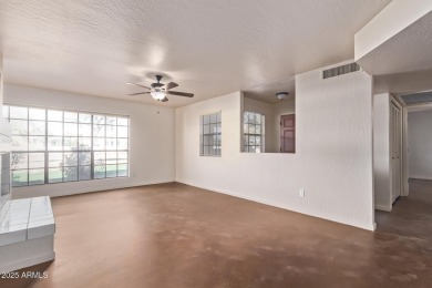 Large two bedroom, two bath townhome with a one car garage on Scottsdale Silverado Golf Club in Arizona - for sale on GolfHomes.com, golf home, golf lot