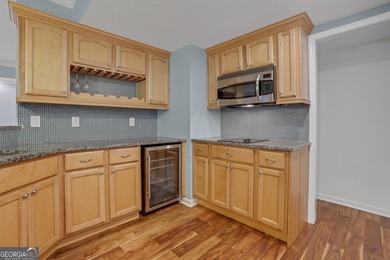 Stunning cul-de-sac home in the prestigious Grandview section of on Windermere Golf Club in Georgia - for sale on GolfHomes.com, golf home, golf lot