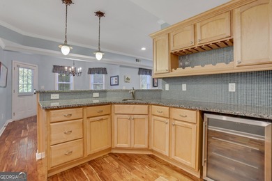 Stunning cul-de-sac home in the prestigious Grandview section of on Windermere Golf Club in Georgia - for sale on GolfHomes.com, golf home, golf lot