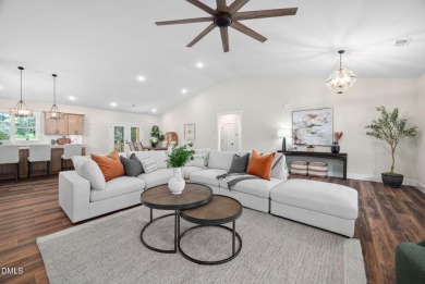 Enjoy one-level living in this beautifully crafted custom ranch on River Golf and Country Club at Lake Royale in North Carolina - for sale on GolfHomes.com, golf home, golf lot