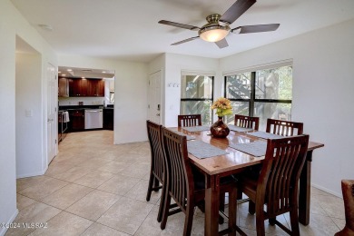 Welcome to this charming first-floor end unit at The Greens at on The Lodge at Ventana Canyon - Canyon  in Arizona - for sale on GolfHomes.com, golf home, golf lot